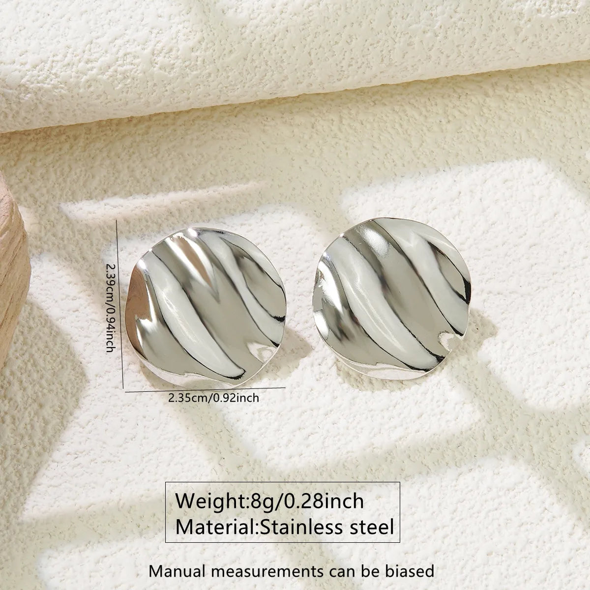 Zarcillos de circulo ondulado