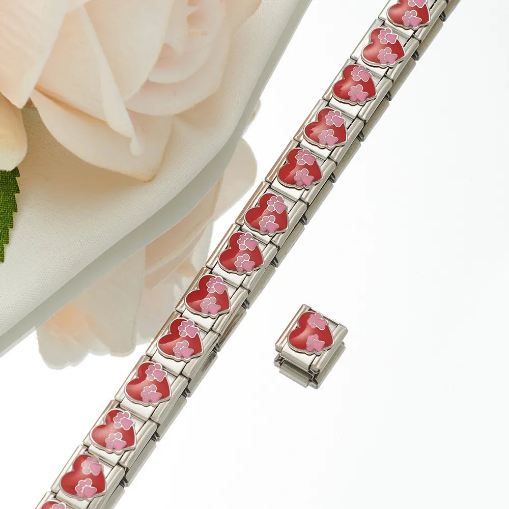 Charm - Corazon rojo con huellas de mascota