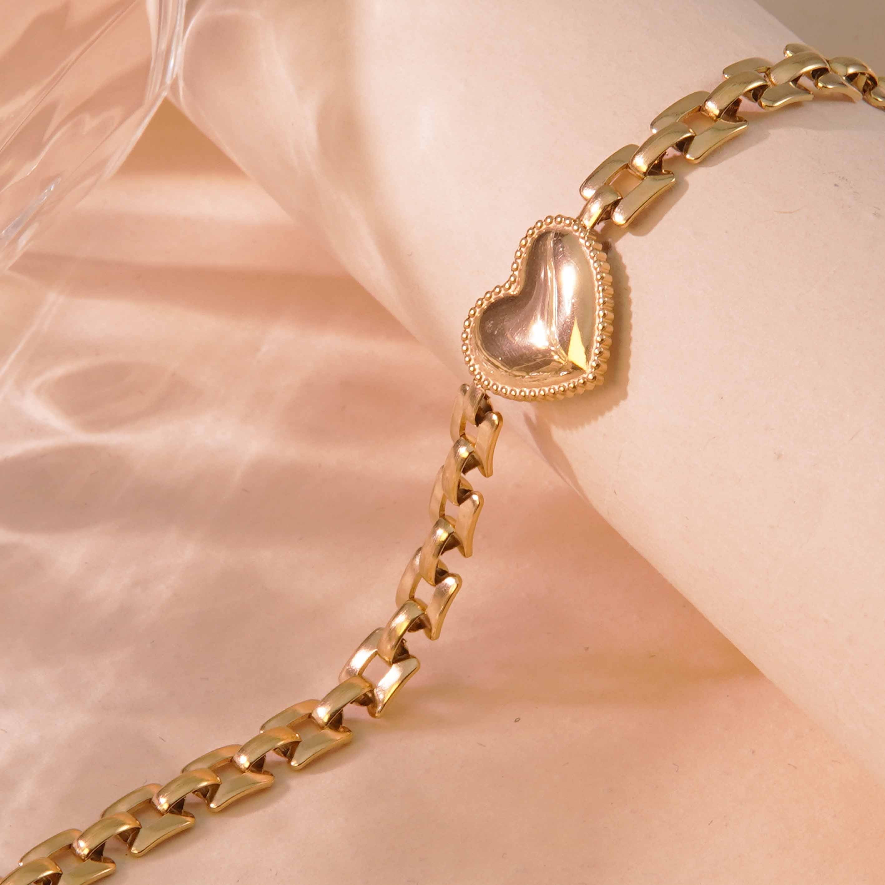 Brazalete de corazon con correa de eslabones