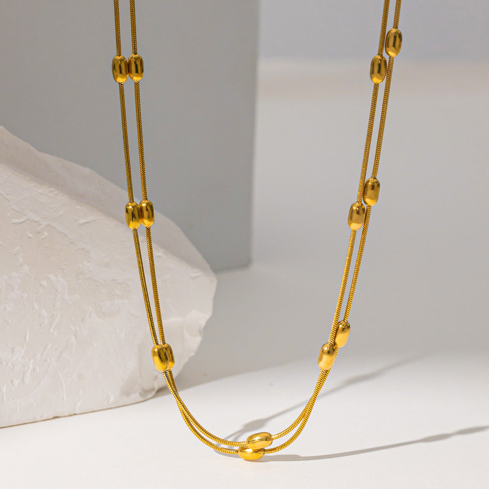 Collar doble con cuentas ovaladas
