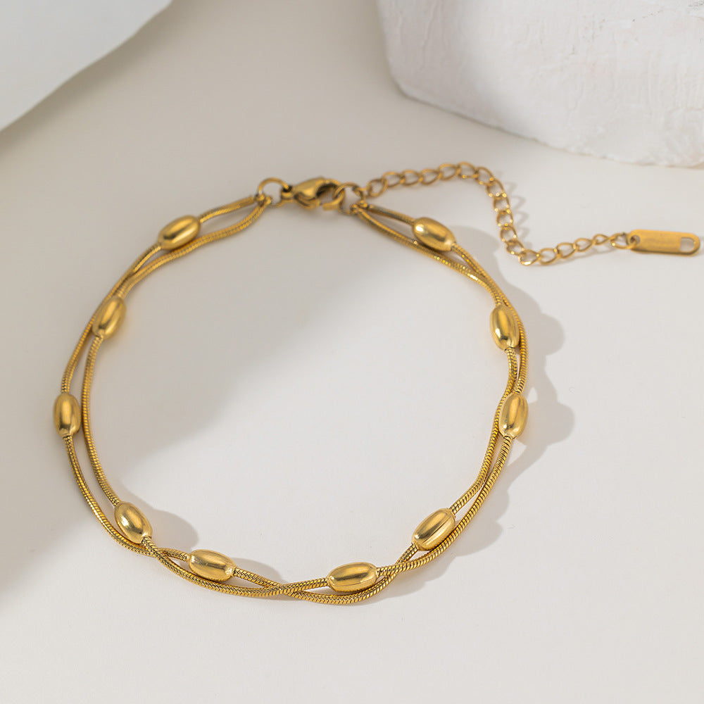 Pulsera doble con cuentas ovaladas