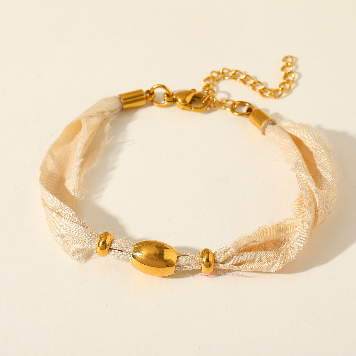 Pulsera de tela color champan