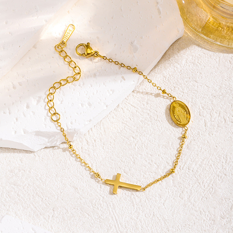 Pulsera con cruz y dije religioso