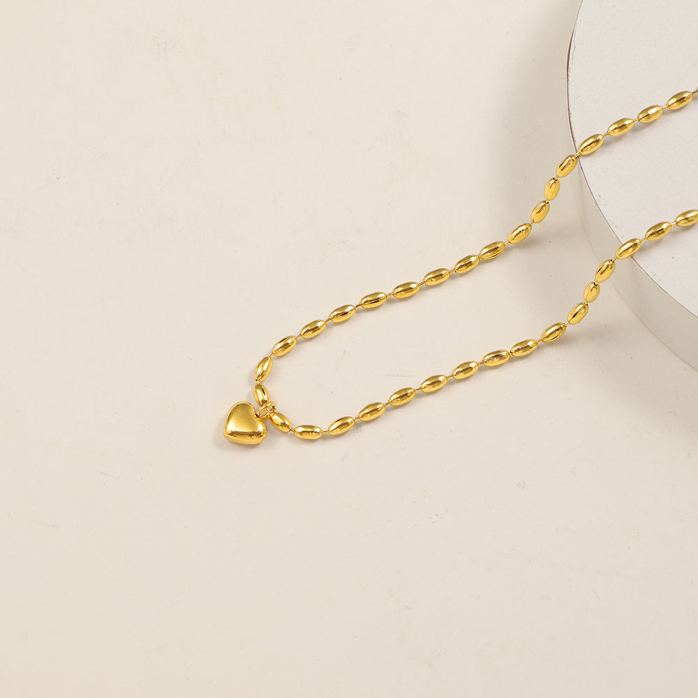 Collar de balines largos con corazon