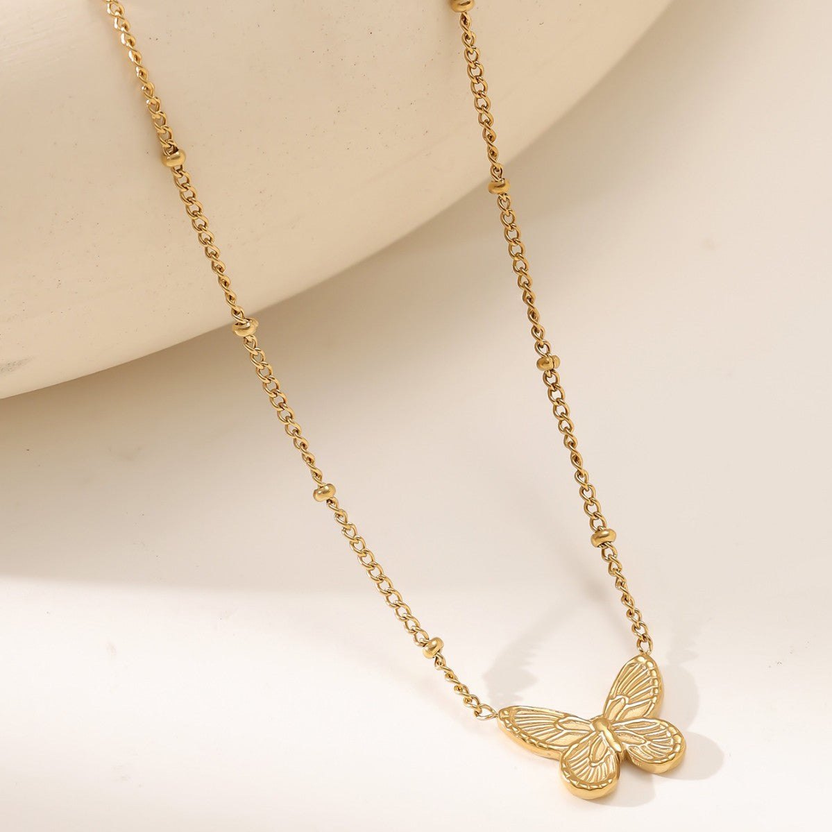 Collar de mariposa