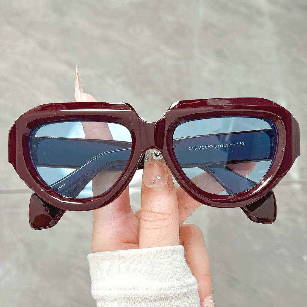 Gafas de sol vinotinto con lente azulado