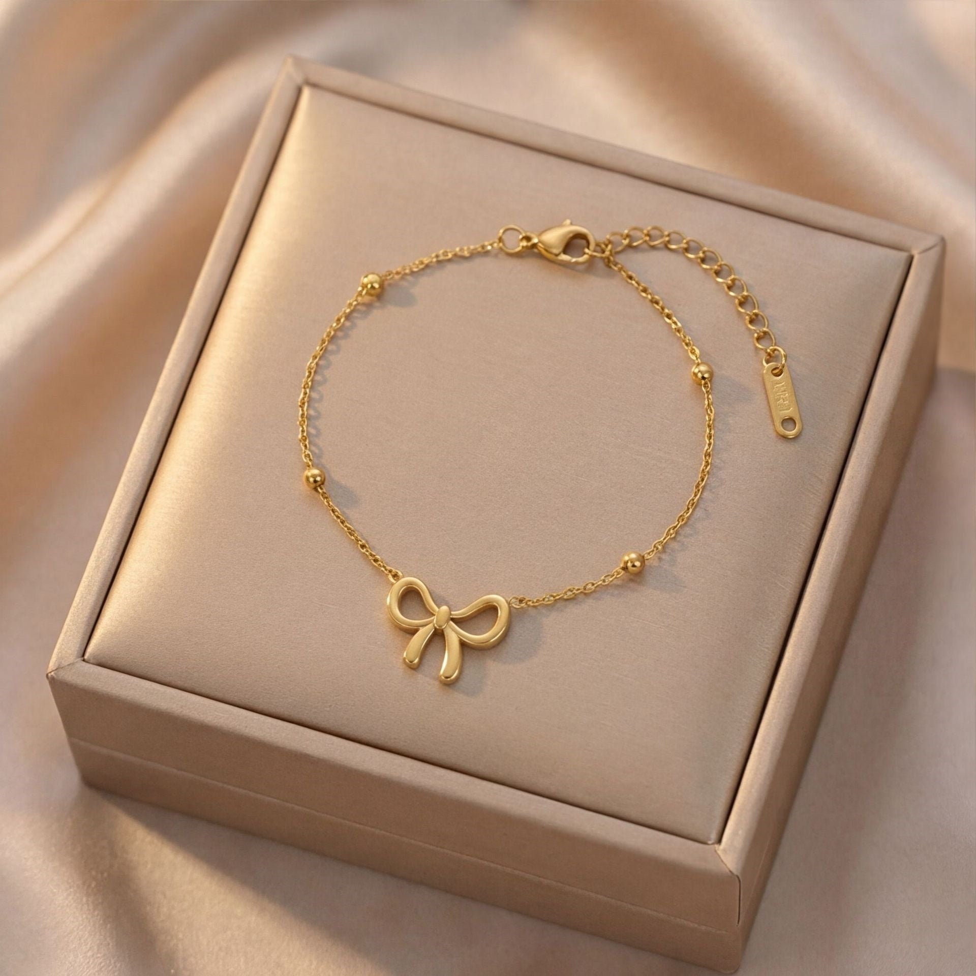 Pulsera de lazo con balines - Dorado