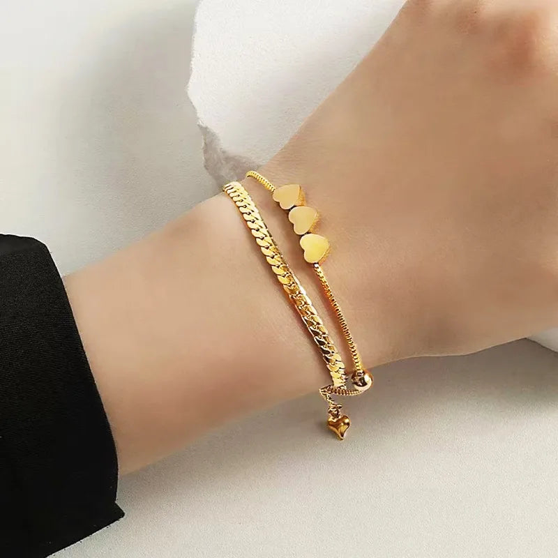 Pulsera doble con triple corazon