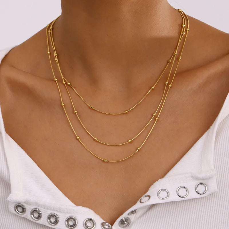 Cadena triple con balines