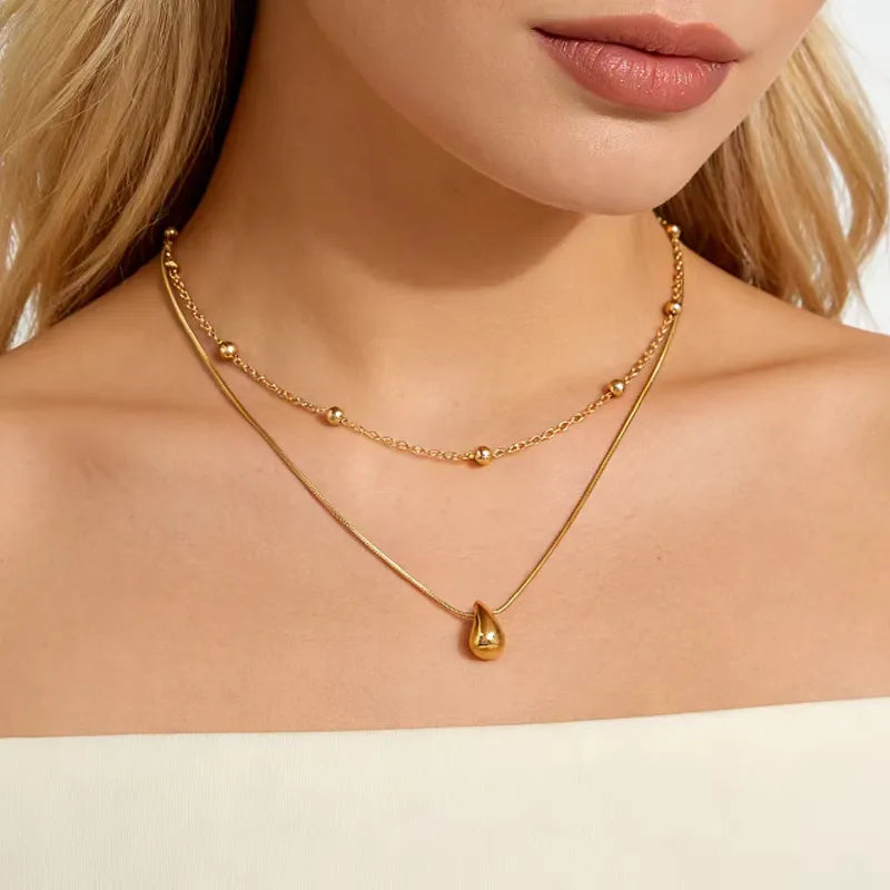 Collar doble de balines con dije de gota