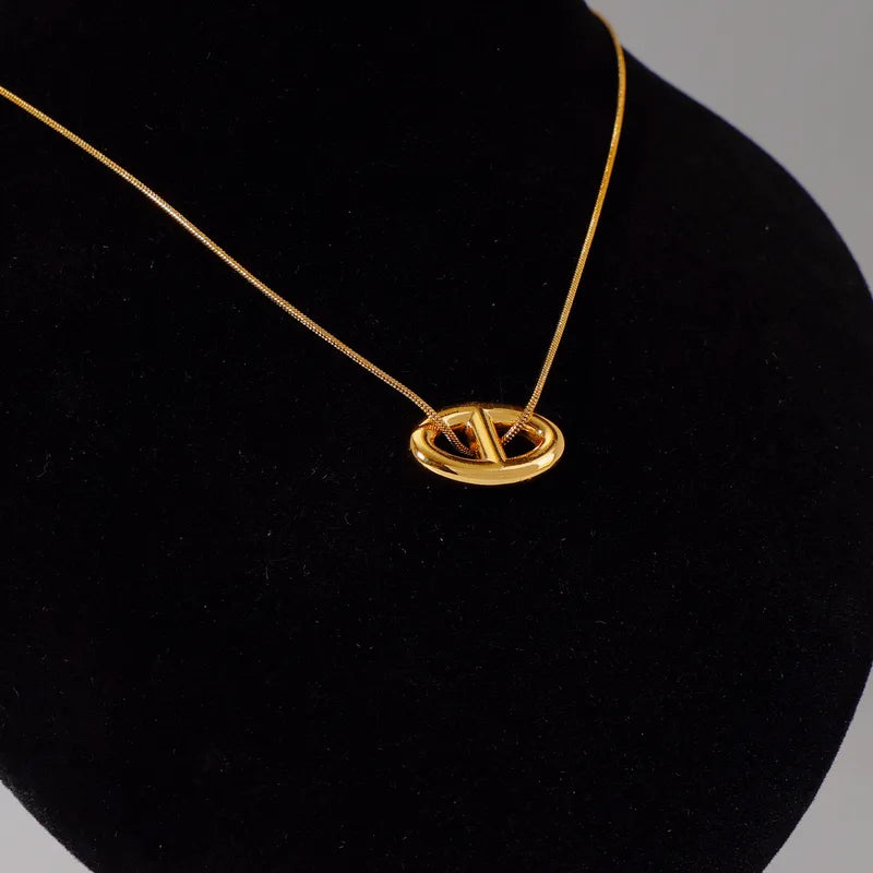 Collar con dije ancla