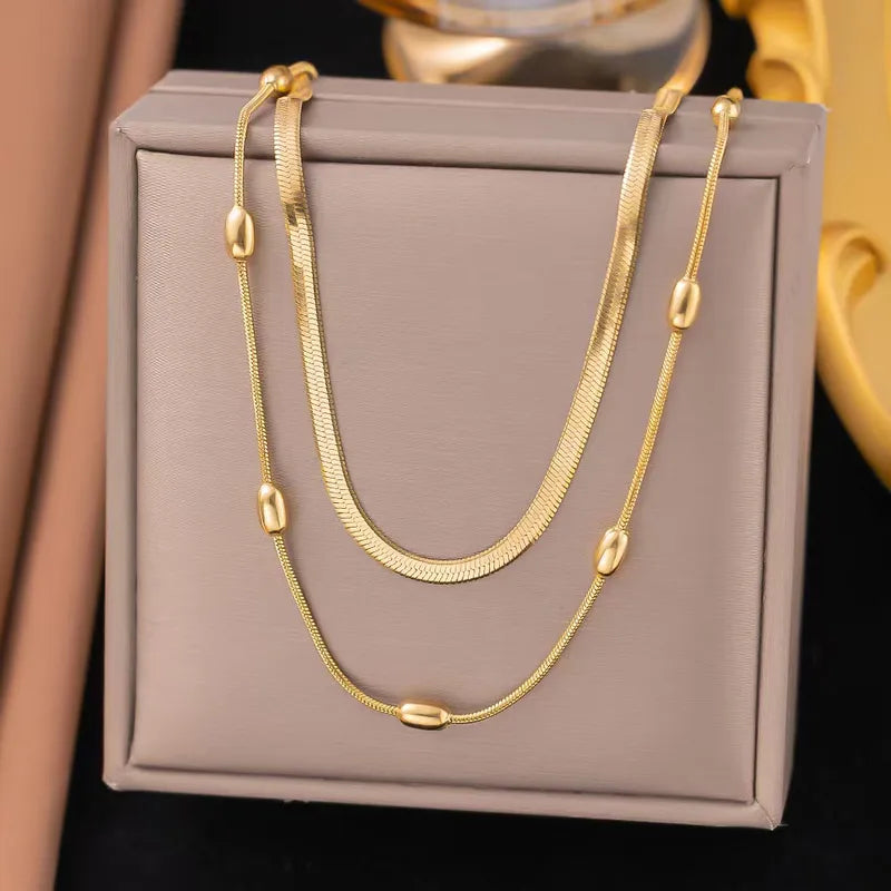 Collar doble de cuentas + serpiente
