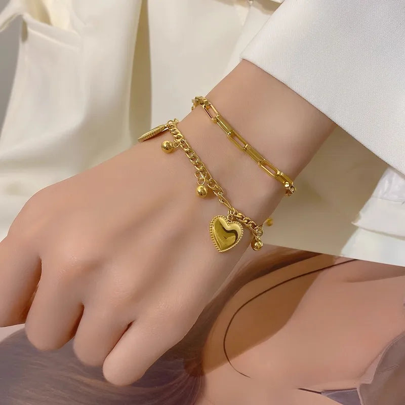 Pulsera doble con balines y corazones