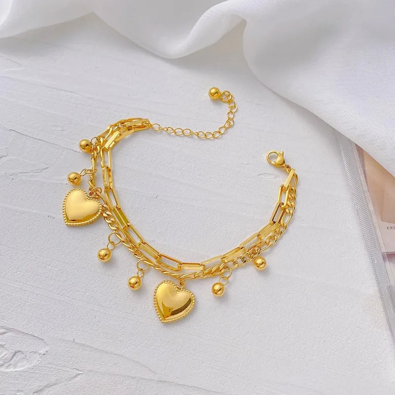 Pulsera doble con balines y corazones