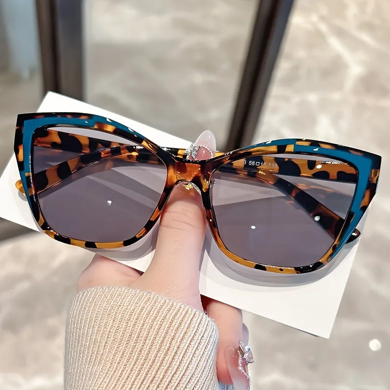 Gafas de sol azul con animal print