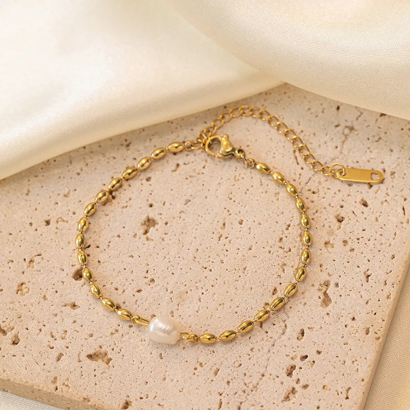 Pulsera de cuentas ovaladas con perla