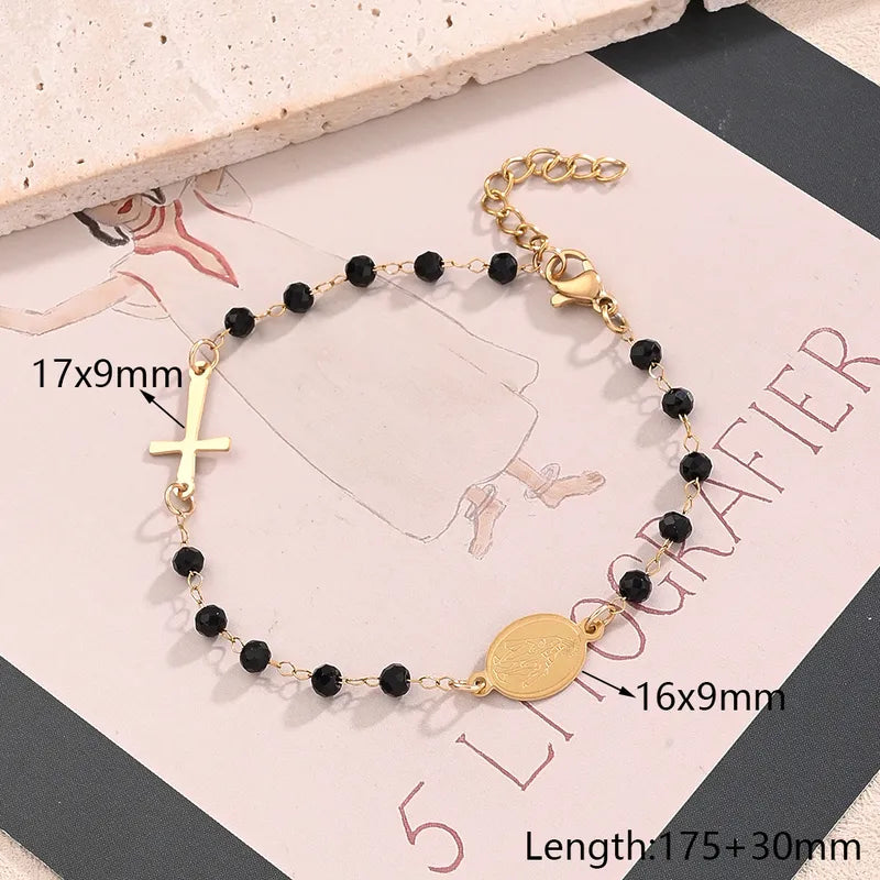 Pulsera religiosa con cuentas negras