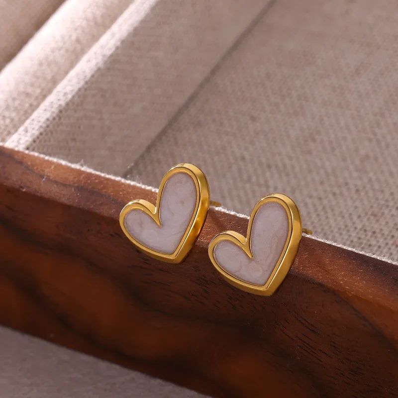 Zarcillos de corazon blanco