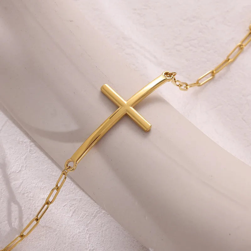 Pulsera de eslabones con cruz
