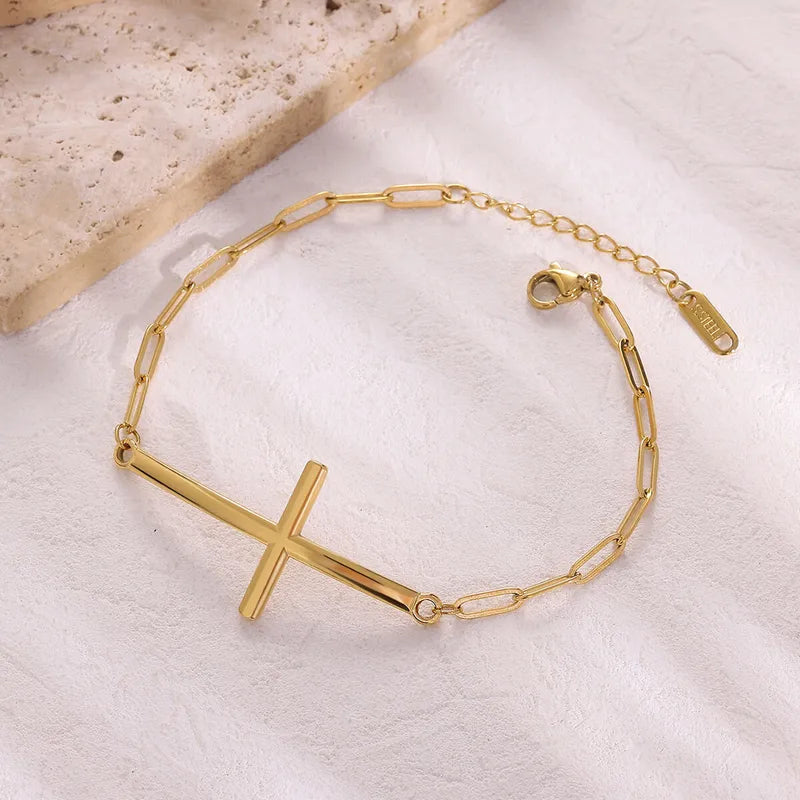 Pulsera de eslabones con cruz