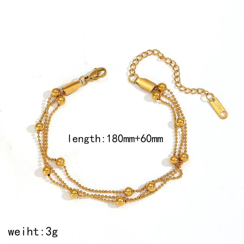 Pulsera triple con balines