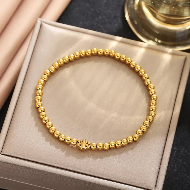 Pulsera de balines con corona