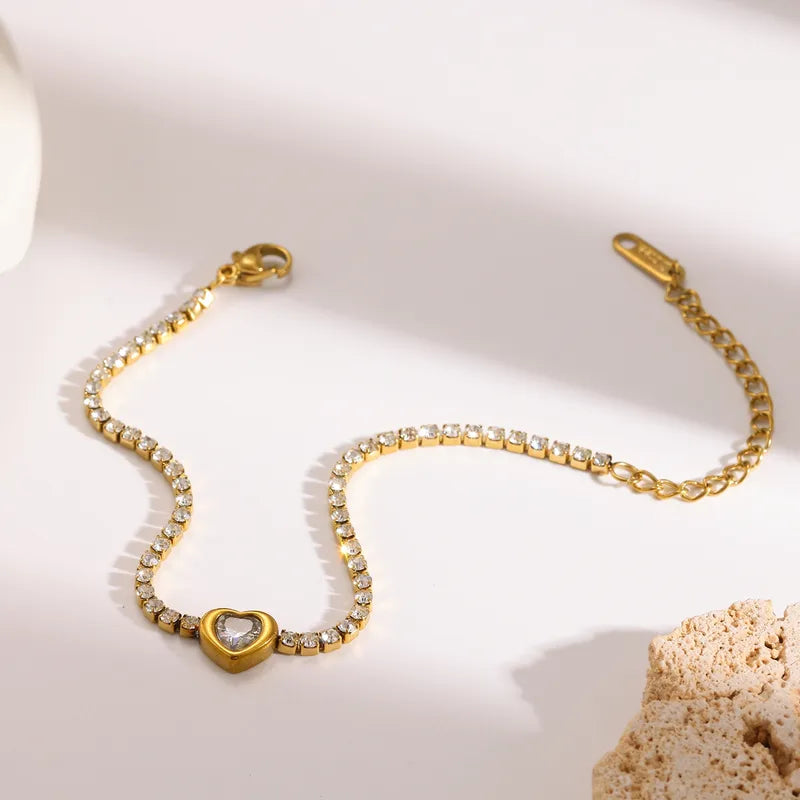 Pulsera estilo tenis con dije de corazon
