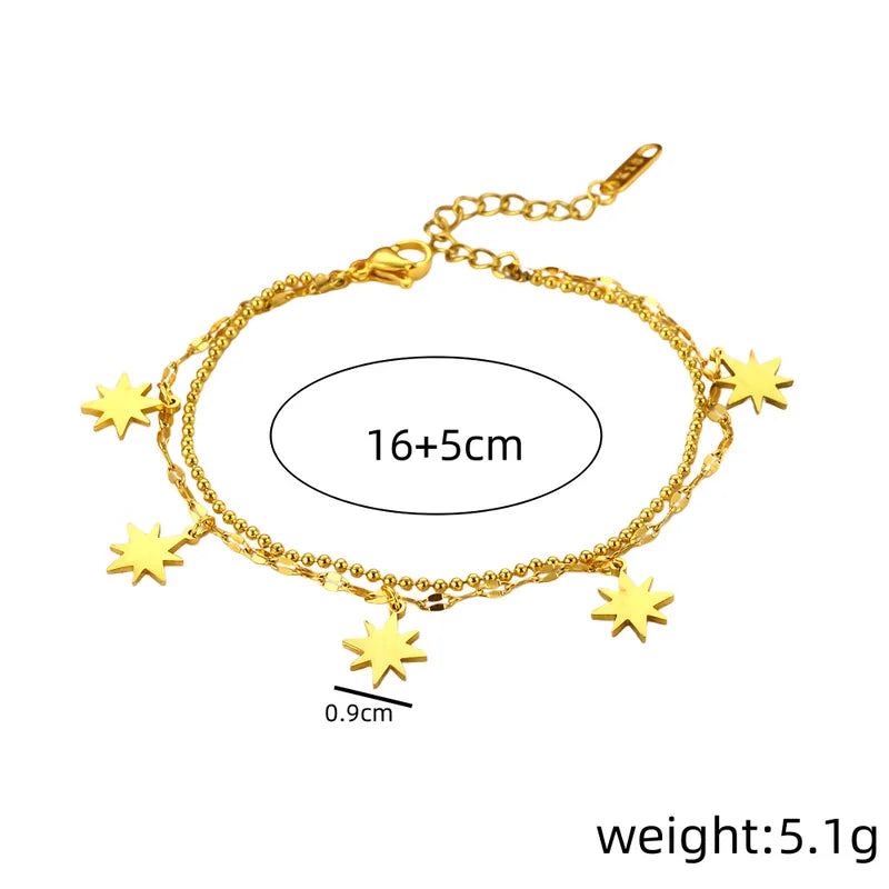 Pulsera doble de estrellas colgantes