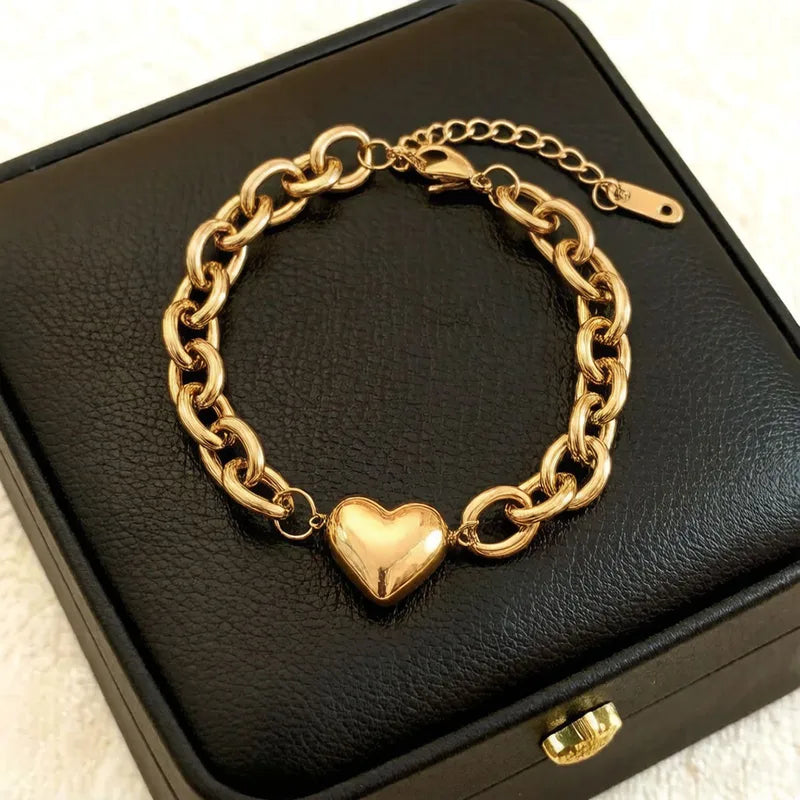 Brazalete de eslabones redondos con corazon