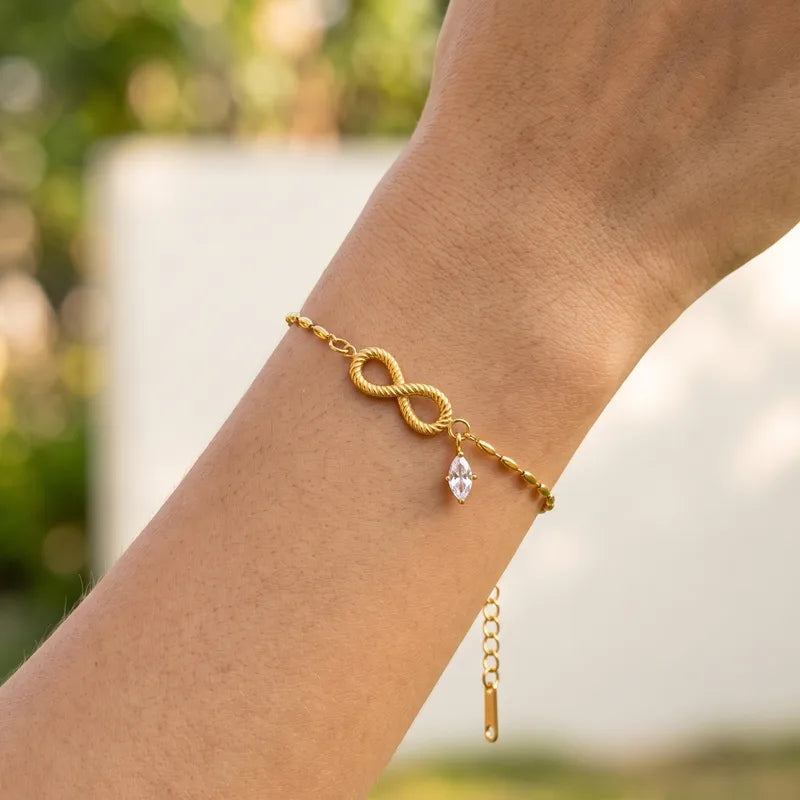 Pulsera de infinito con cristal colgante