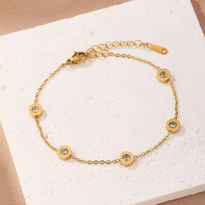 Pulsera de dijes romanos
