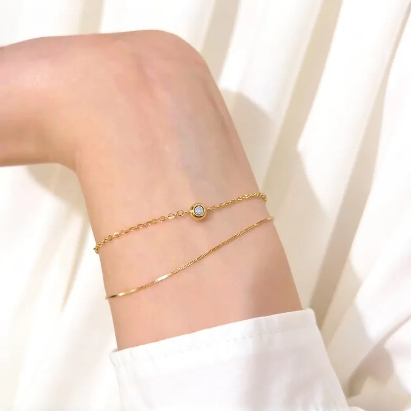 Pulsera doble de punto de luz redondo