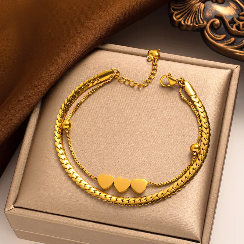Pulsera cubana doble con triple corazon