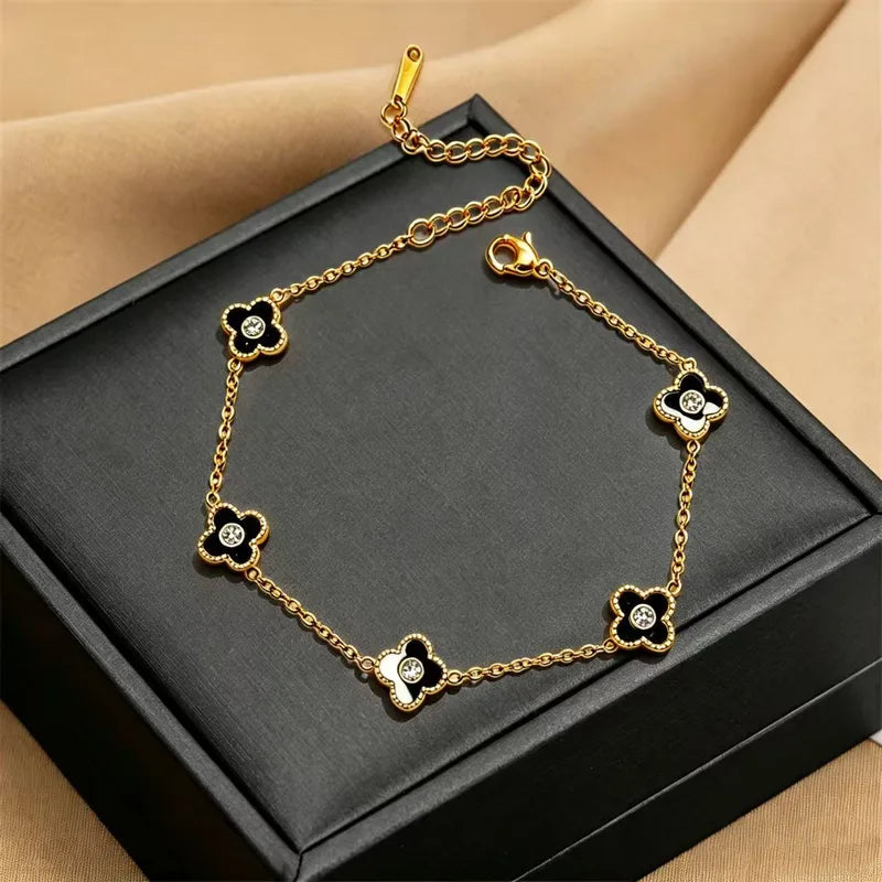 Pulsera de trebol negro - Dorado