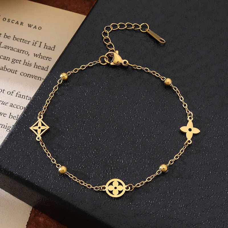 Pulsera basica de balines con dijes variados
