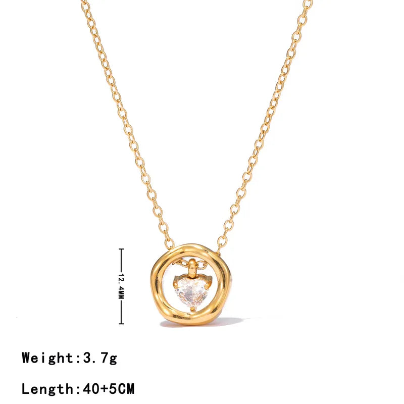 Collar de dije circular con corazon de cristal