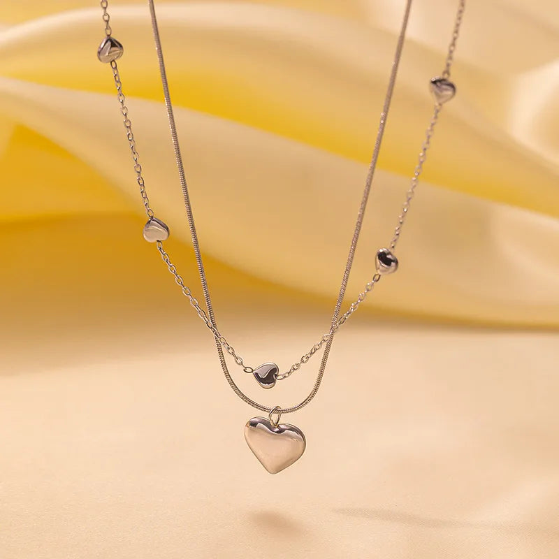 Collar doble de corazones