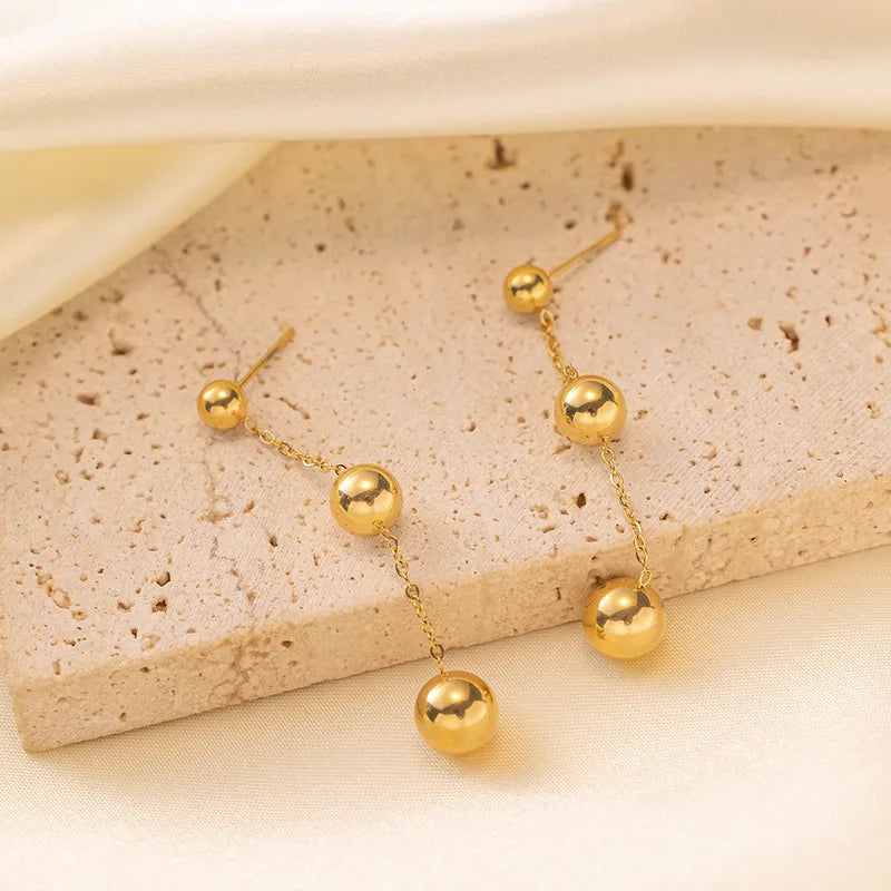 Zarcillos balines colgantes