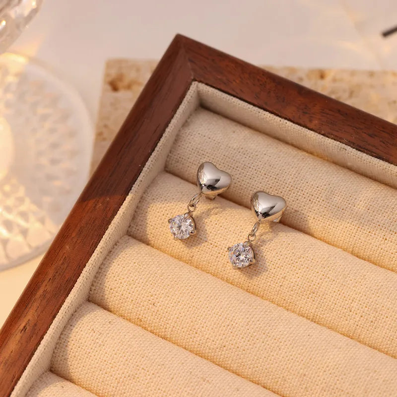 Zarcillos de corazon con cristales colgantes