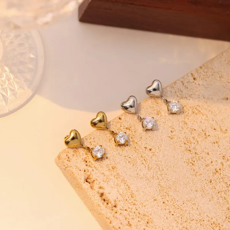 Zarcillos de corazon con cristales colgantes