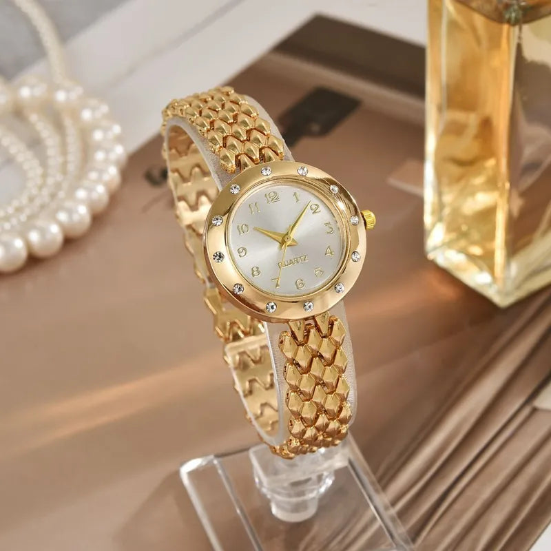 Reloj redondo con circones - Dorado
