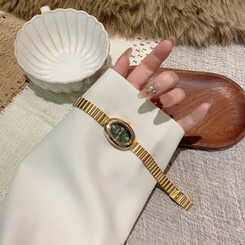 Reloj Naidu Luxury - Dorado con bisel verde