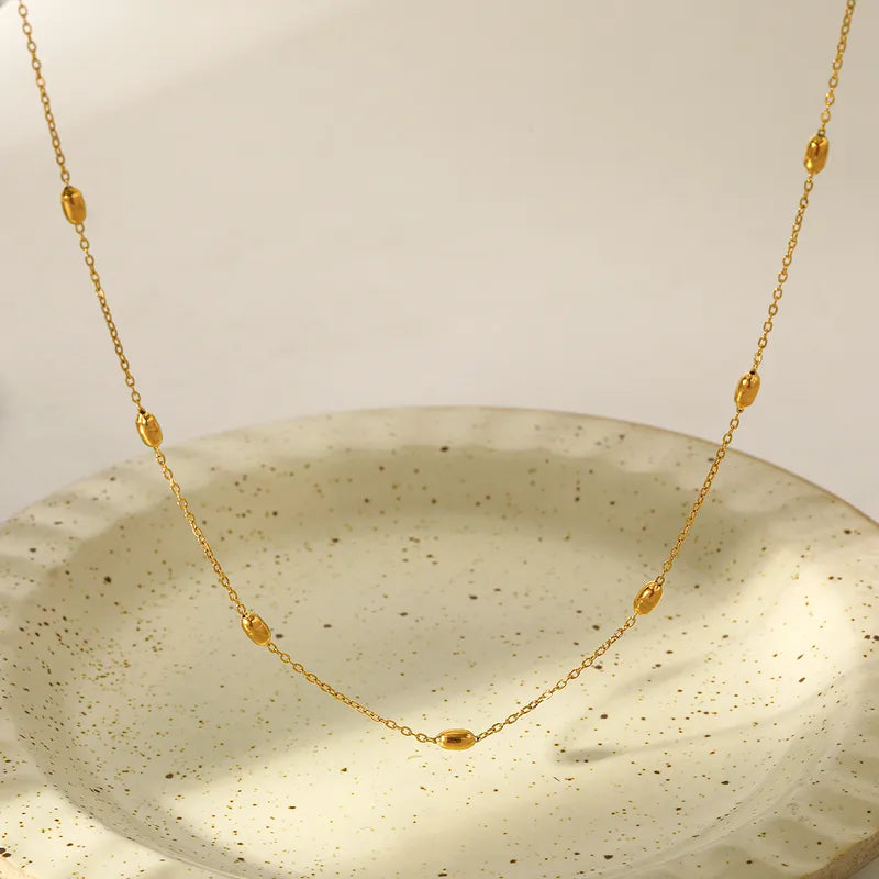 Collar basico de cuentas ovaladas - Dorado