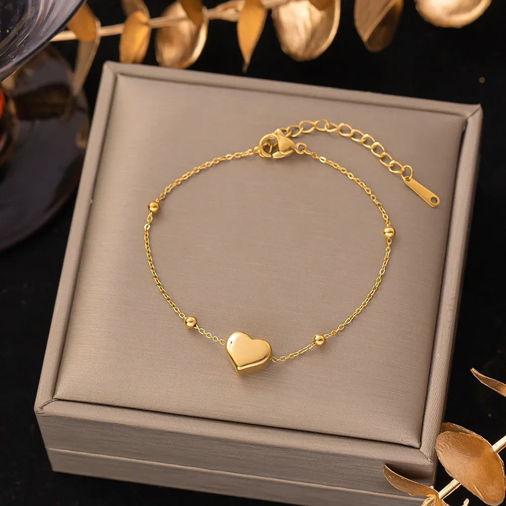 Pulsera de corazon con balines