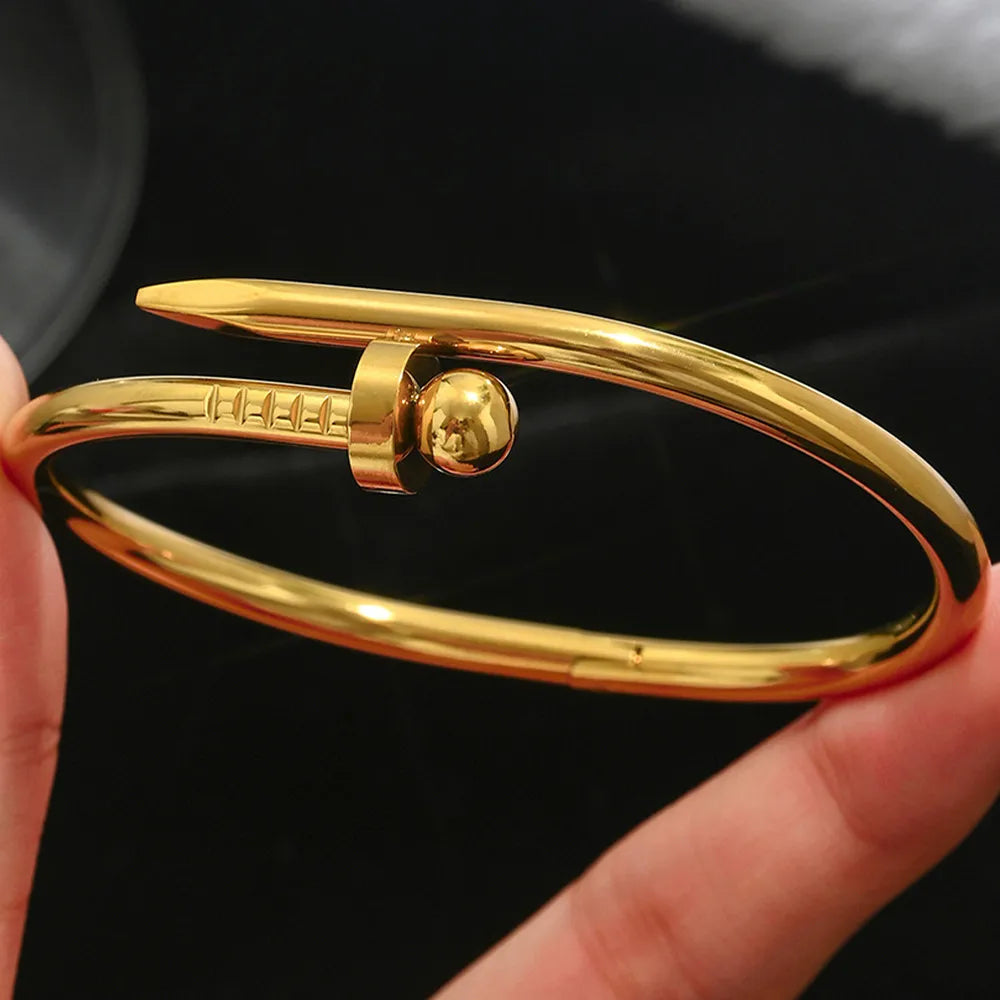 Brazalete rigido de clavo con punta redonda