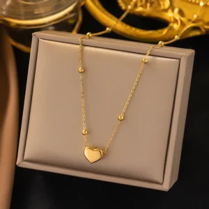 Collar de corazon con mini balines
