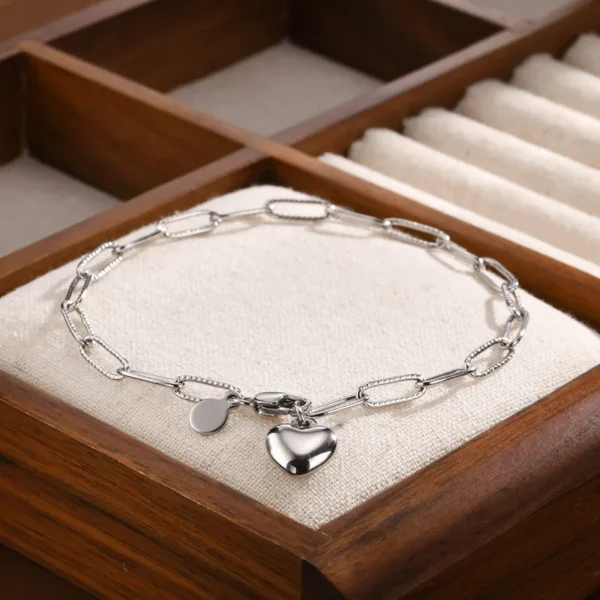 Pulsera de eslabones con corazon colgante - Plateada